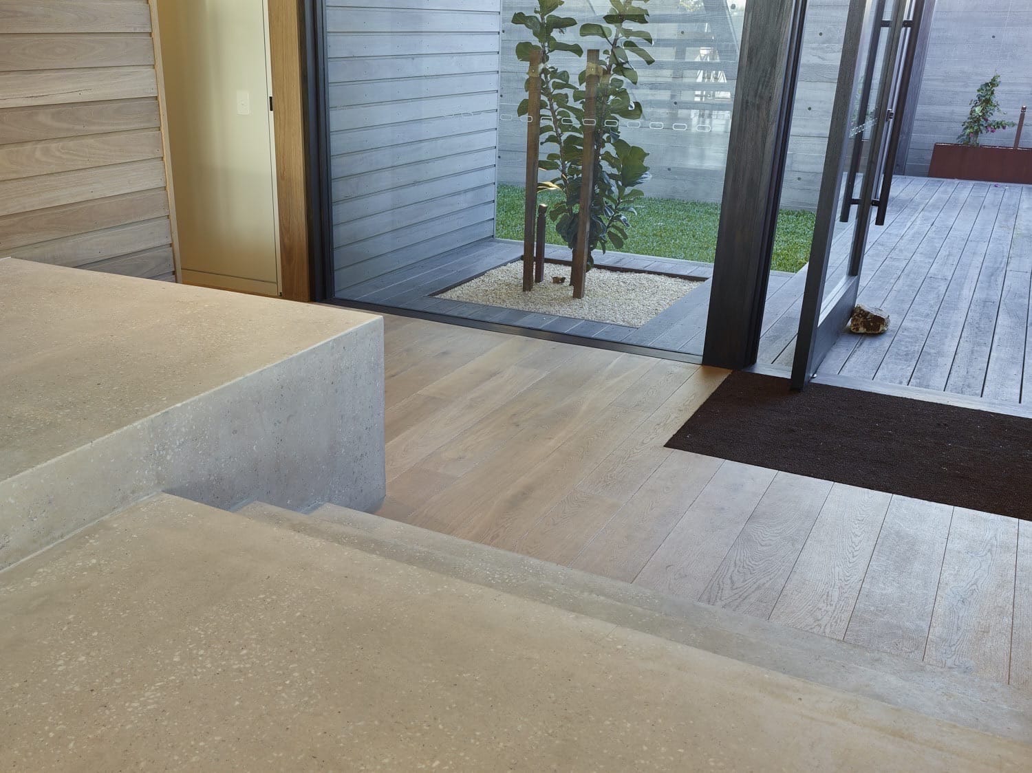 Concrete polishing for residential and commercial floors on the Sunshine Coast and Brisbane. - Honed & Polished Concrete working in the studio